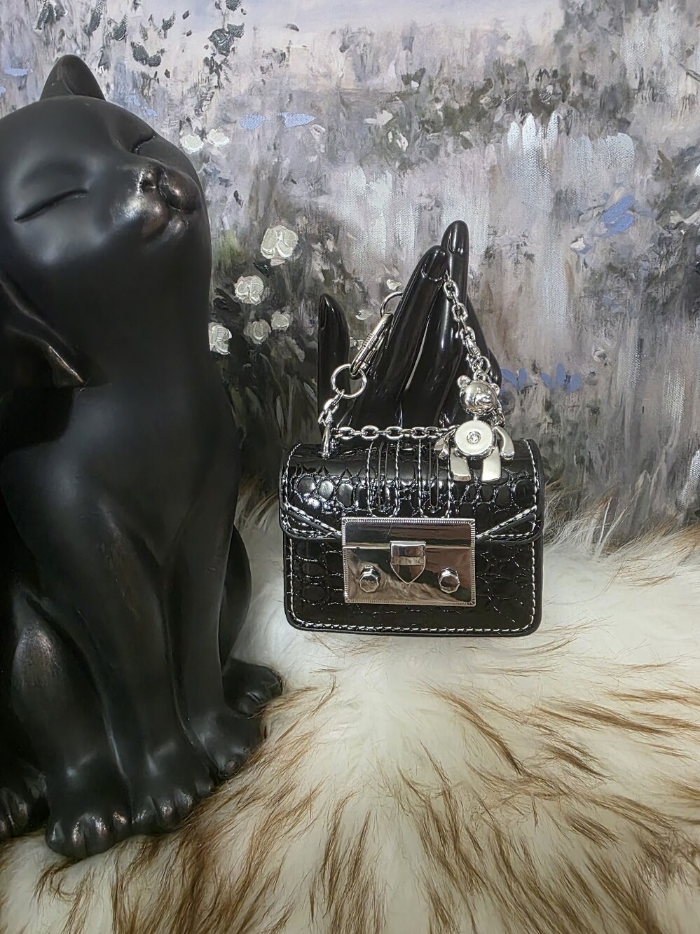 Brand new clip on mini pout in geniune leather deep brown. (no Coach bag)